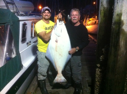 Todd Haynes of Nautical West Charters and Mike Shelton are holding a 55 lb Halibut Mike caught in the Dougals Channel Sept 6th 2012.